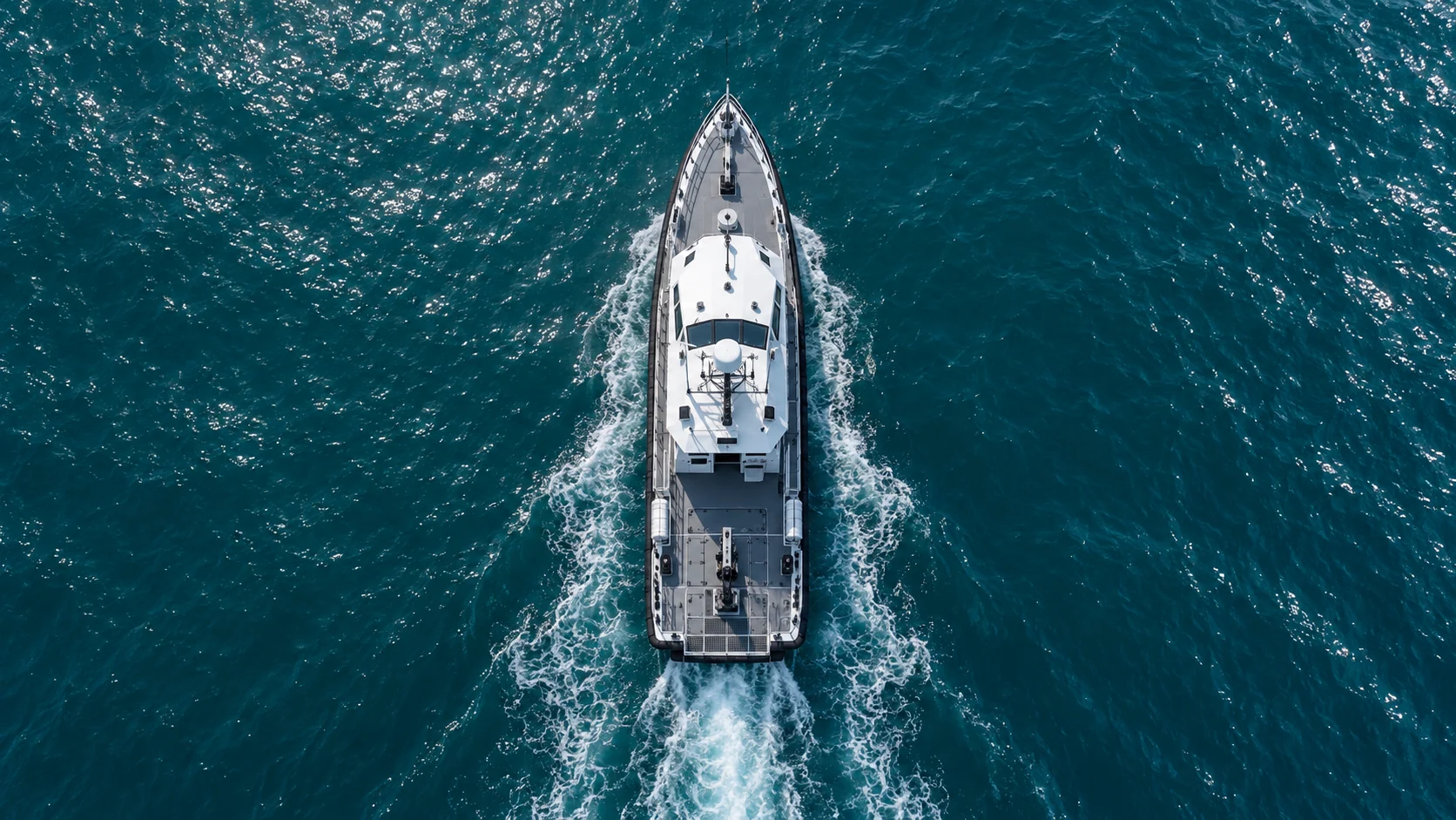 Illustrative top-down view of a patrol vessel in open water
